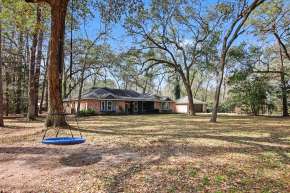 homes for sale in Tomball TX in established neighborhood of Rosewood Hill with mature trees