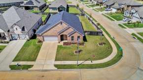 newer homes for sale in Tomball TX with open floorplan and large kitchen